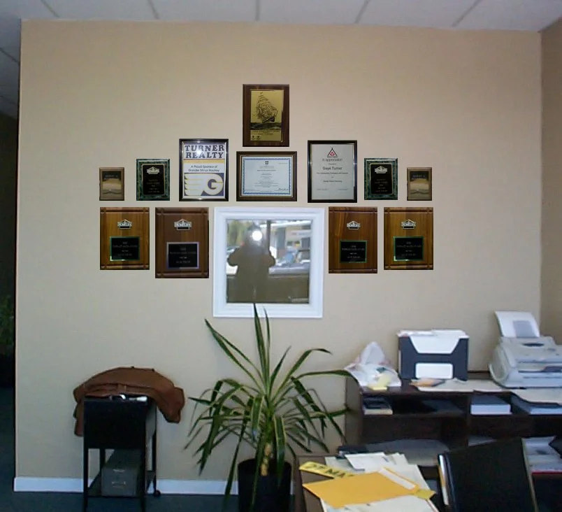 Award wall at the original Turner Realty office