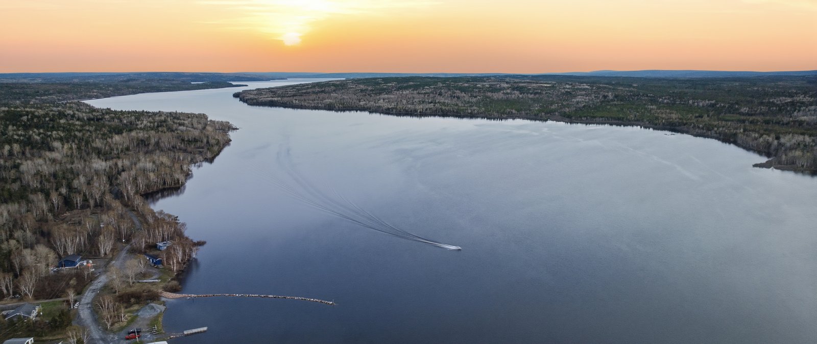 Boating on the Exploits River at sunset, Appleton boat launch