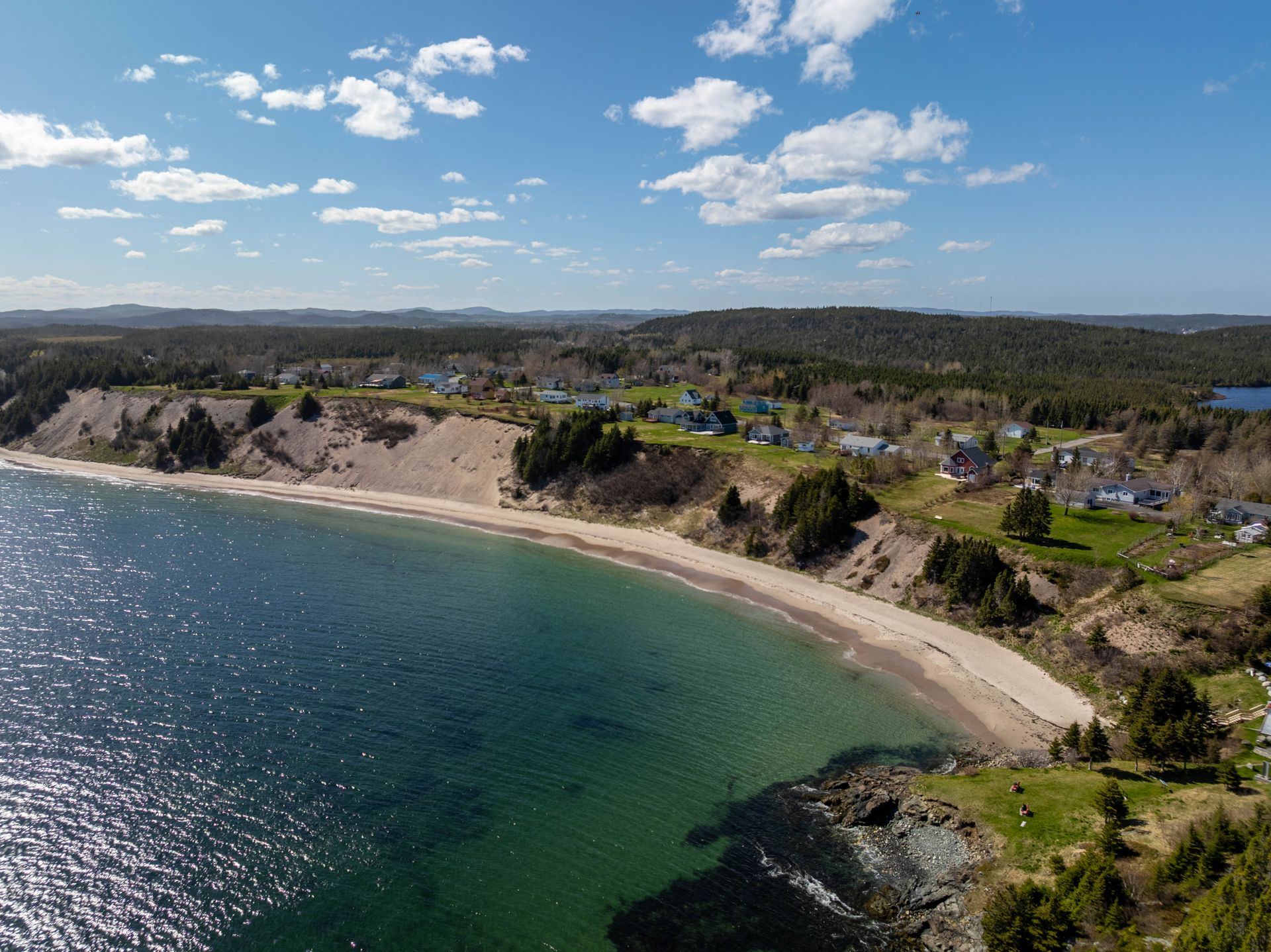 Aerial of Eastport's sandy beach and town on Bonavista Bay